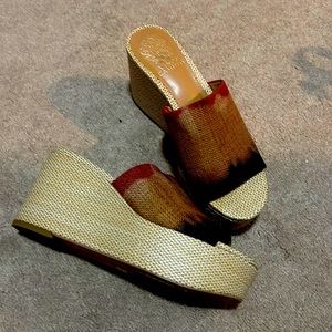 Nice wedge sandal. Only worn once inside my home.